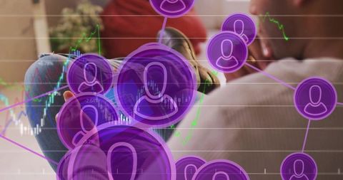 Couple relaxing on sofa with purple social network and candlestick chart overlays