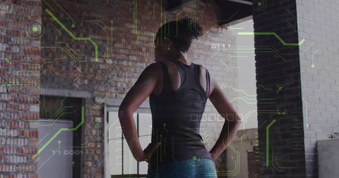 Modern Woman Embracing Fitness with Technological Innovation