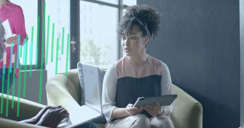 Modern Business Meeting with Technology and Data