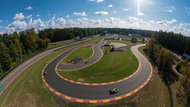 Aerial View of Winding Go-Kart Track in Scenic Forest Setting