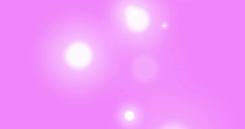 Glowing light spots on pink background