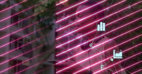 Young Woman Engages with Mobile Tech in Urban Neon