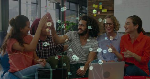 Diverse Team Celebrating Success with Digital Network Overlay