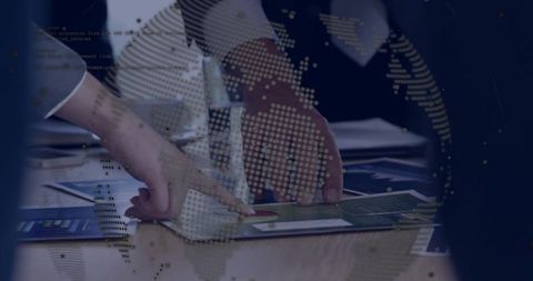 Business Team Analyzing Data with Digital Global Overlay