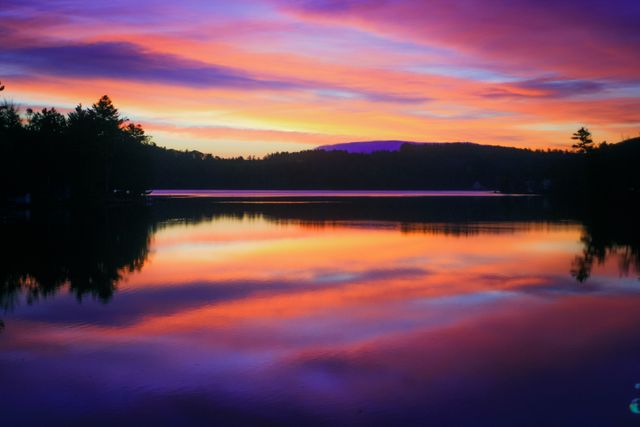 Serene Lake Sunset with Vivid Sky Reflections - Download Free Stock Photos Pikwizard.com