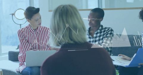Business team collaborates on financial data analysis in modern office