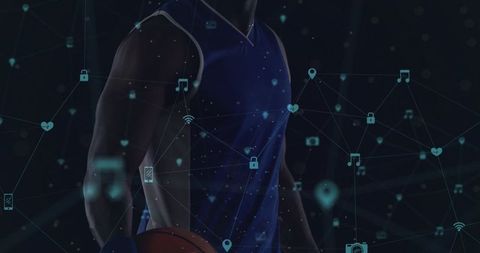 Male basketball player holding ball at hip wearing blue jersey with digital sports data overlay