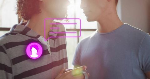 Backlit morning couple holding mug, striped hoodie and blue tee, digital chat icon overlay