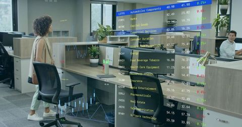 Business Woman Analyzing Digital Stock Market in Modern Office