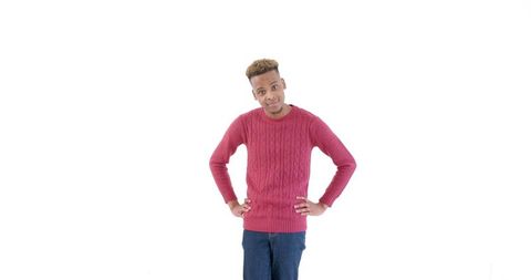 Confident Young Man in Red Sweater in Studio Pose - Download Free Stock Images Pikwizard.com