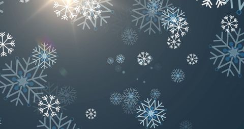Falling christmas snowflakes on grey background