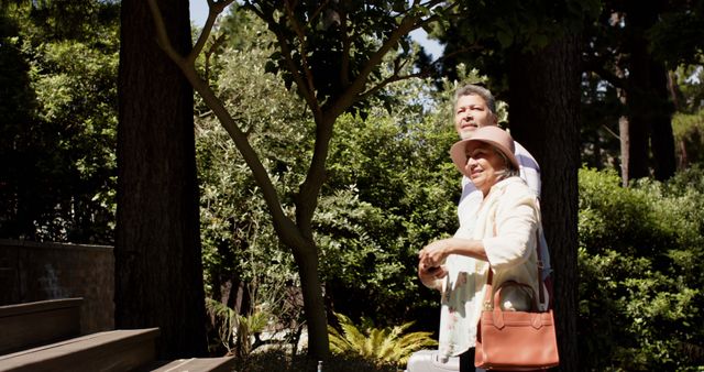 Elderly Couple Enjoying Outdoor Walk in Forest Park - Download Free Stock Images Pikwizard.com