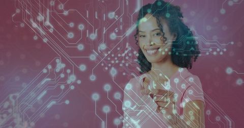 Woman Celebrating Technology Through Heart Gesture with Circuit Pattern