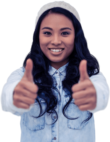 Young Asian woman giving a thumbs up gesture with a bright smile, her casual attire featuring a denim shirt and winter beanie. The transparent background makes her perfect for creative projects, presentations about positivity, advertisements focusing on encouragement or customer satisfaction, and various web designs requiring a cheerful touch.