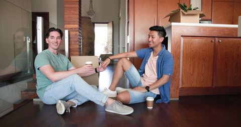 Happy Couple Sharing Coffee and Bonding at Home