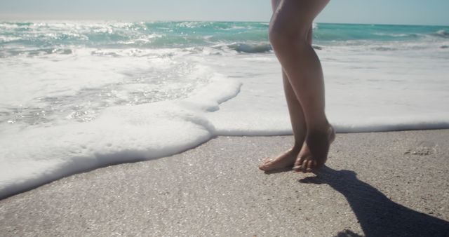 Feet on Sandy Beach with Rolling Waves in Sunshine - Download Free Stock Images Pikwizard.com