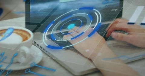 Typing on laptop with futuristic blue hud overlay, latte on table, modern remote work