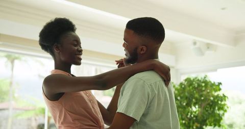 Couple Dancing Embracing Each Other Joy at Home