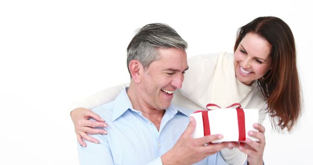 Happy Couple Exchanging Gift, Celebrating Special Occasion - Download Free Stock Images Pikwizard.com