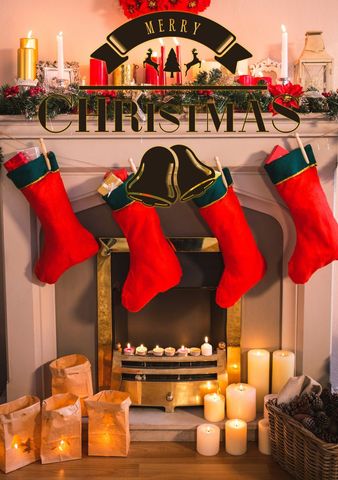 Cozy christmas fireplace with stockings and festive decor