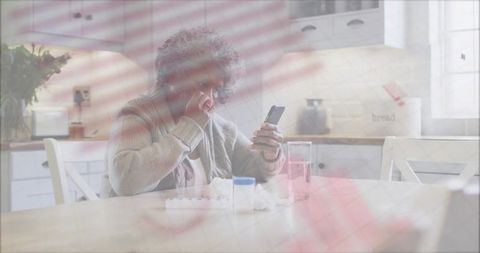 Elderly woman managing health with smartphone at home