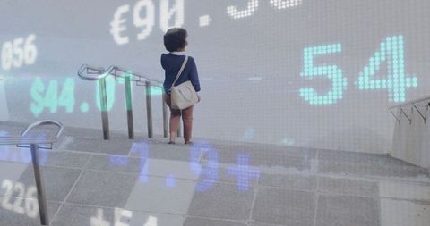 Woman navigating concrete stairs with currency data overlay
