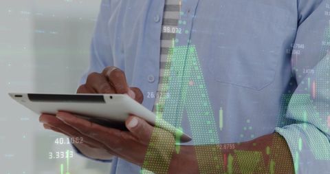 Businessman Analyzing Financial Data on Tablet With Virtual Charts - Download Free Stock Images Pikwizard.com
