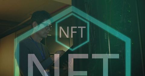 Asian Male Technician in Server Room with NFT Overlay Concept