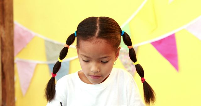 Young Girl Engaging in Creative Activity with Bunting Flags Background - Download Free Stock Images Pikwizard.com