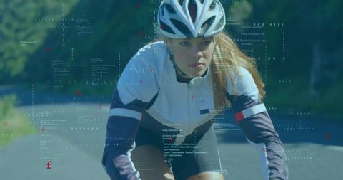 Woman Cyclist on Scenic Rural Road in Sunlit Forest