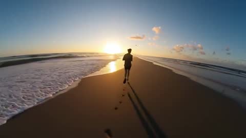 Running at Sunrise Along Ocean Beach