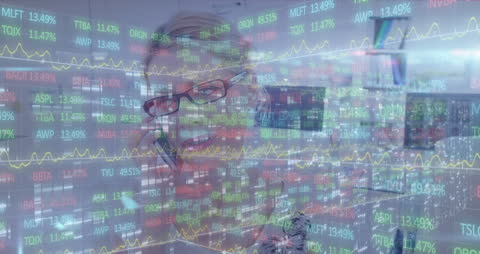 Businesswoman Engaged with Financial Data Projection