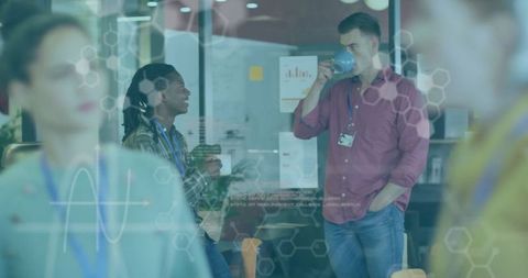 Business Team Discussing with Digital Graph Overlay in Modern Office