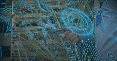 Man Hand Holding Ethernet Cables in Server Room with Digital Circuit Overlay - Download Free Stock Images Pikwizard.com