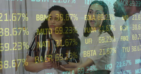 Diverse Business Team Analyzing Financial Data in Digital Environment