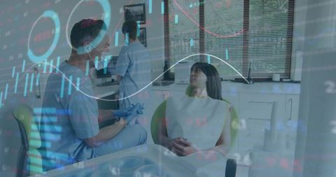 Dentist consulting with reclining patient in dental chair with digital data overlay