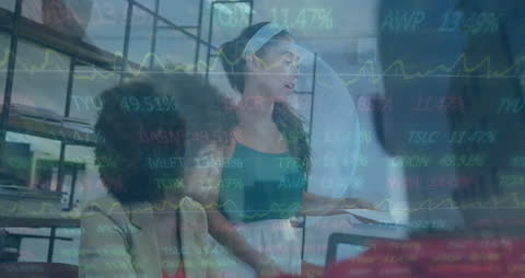 Global Business Team Analyzing Stock Market Data in Modern Office