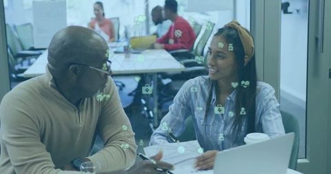 Diverse professionals discussing data security in modern office