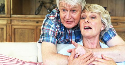 Senior Couple Enjoying Relaxing Evening Watching TV at Home - Download Free Stock Images Pikwizard.com