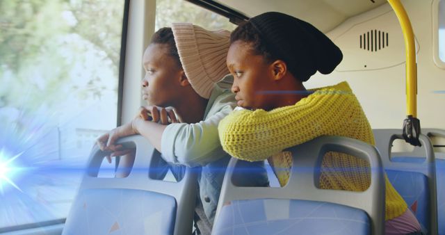 Two Young People Contemplating Outside Window on Bus Ride - Download Free Stock Images Pikwizard.com