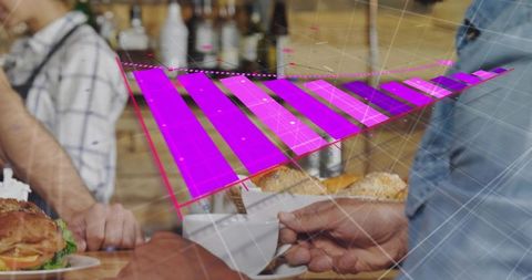 Floating magenta holographic bar chart overlaying cafe counter with cup and croissant
