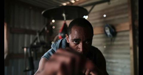 Focused African American Boxer Training Intently in Gym - Download Free Stock Images Pikwizard.com