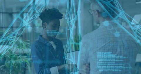 Colleagues collaborating with tablet and holographic AR interface in modern tech workspace