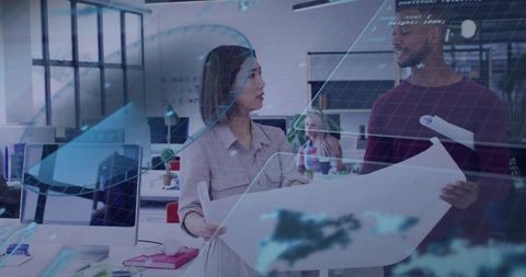 Architects Discuss Blueprint in Modern Office with Holographic Technology