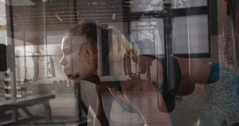 Determined Fitness Partners Empowering Each Other in Modern Gym