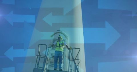 Wind Farm Technician at Turbine with Overlay of Digital Arrows