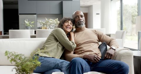 Happy Couple Relaxing at Home Watching TV - Download Free Stock Images Pikwizard.com
