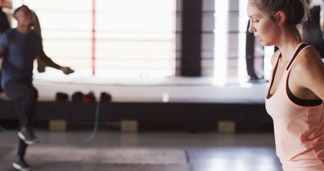 Young Woman Exercising in Gym During CrossFit Training - Download Free Stock Images Pikwizard.com