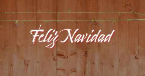 Christmas Greeting 'Feliz Navidad' on Wooden Background