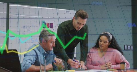 Professionals analyzing data in modern corporate meeting